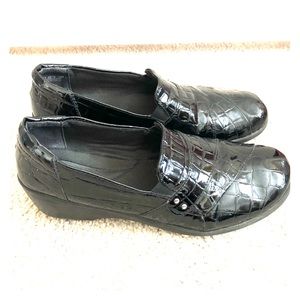 Clark’s black patent leather slip on shoes!